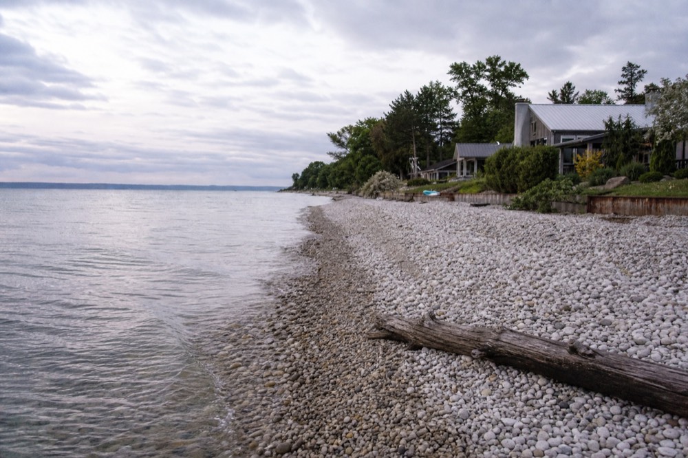Quiet shoreline on a peninsula with calm water and no crowd